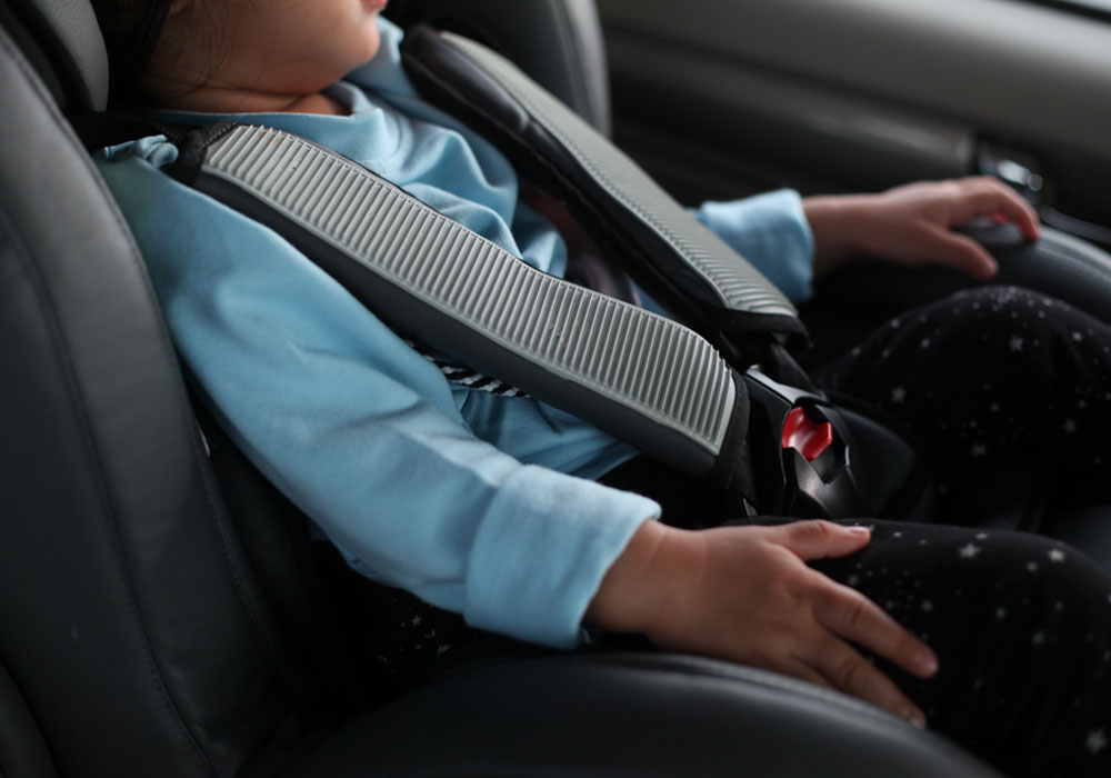 child in a car seat 