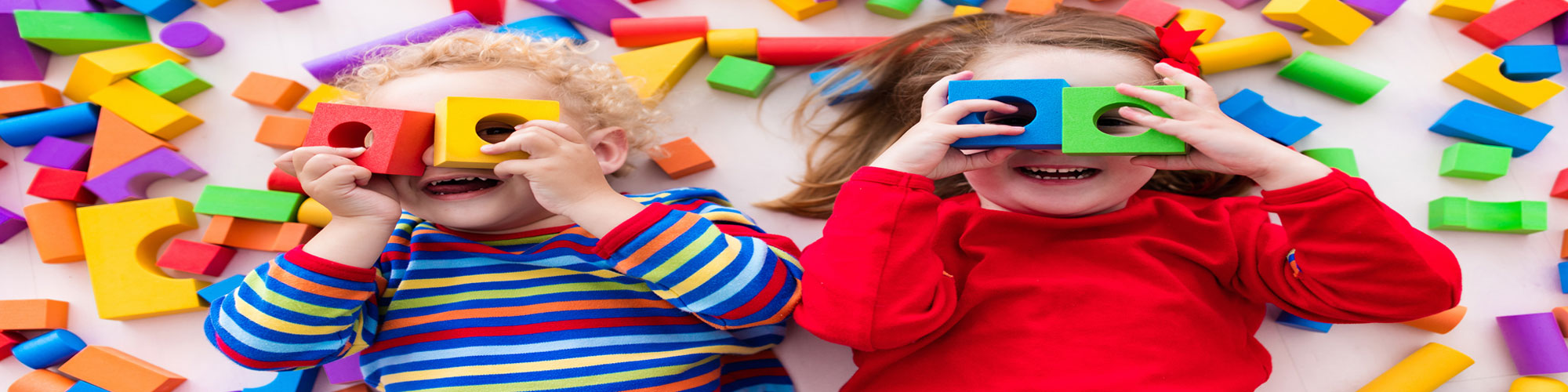 kids playing with building blocks 